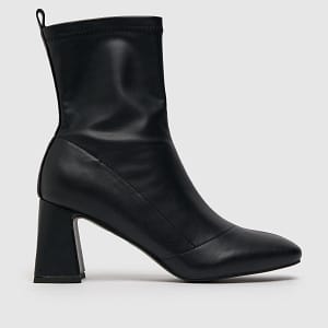 Black flared heel ankle boots by Schuh